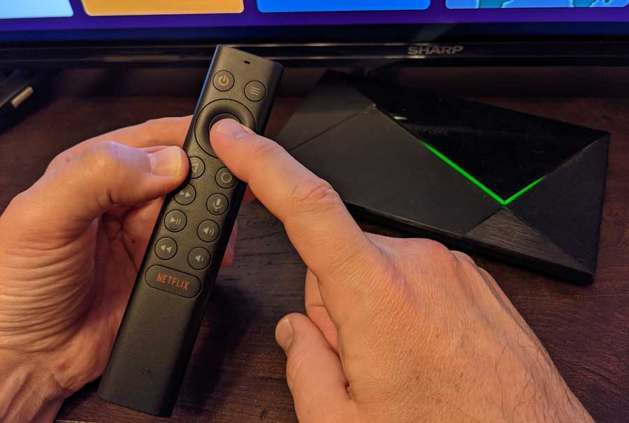 If your remote is currently paired to another device, hold down the OK button and the Back button to put it into pairing mode. 