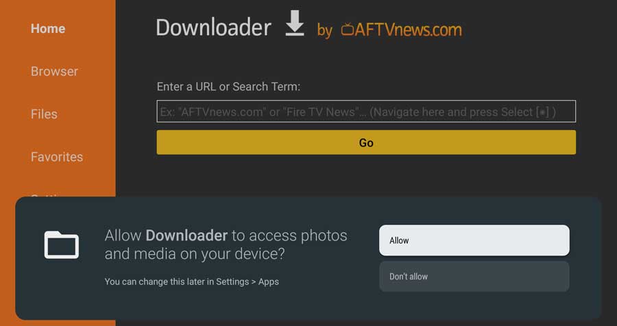 Allow Downloader permission to access photos and media on your device.